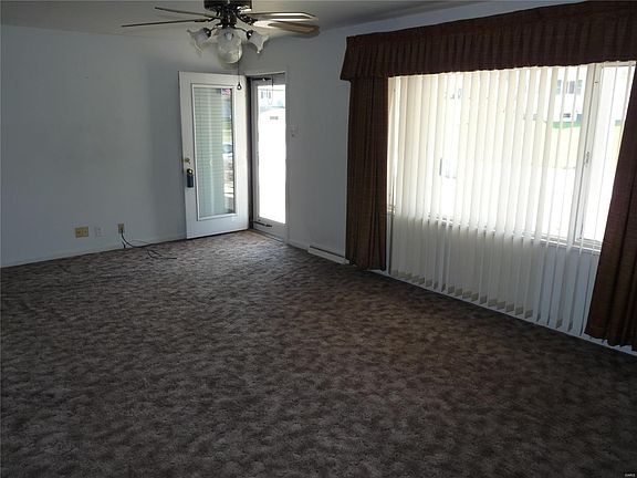 Living Room has large picture window.