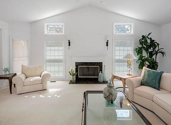 Neutral colors throughout this upgraded home & A Elegant Fireplace !!