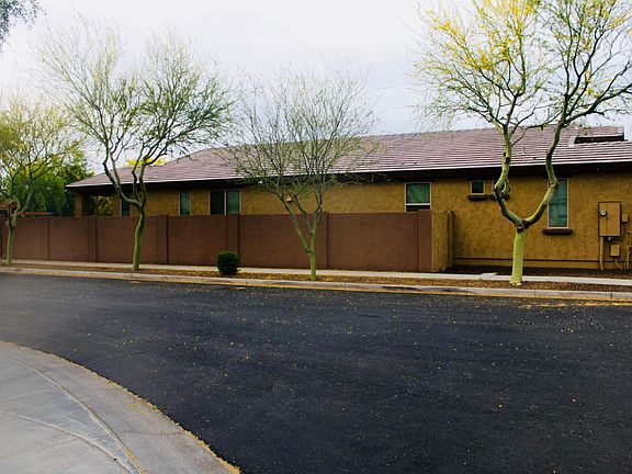 Full enclosed corner lot features fewer surrounding neighbors.