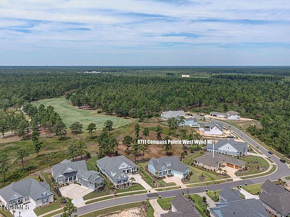 5th image of 8711 Compass Pointe West Wynd NE