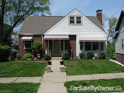 Front view of house.
						:
						Beautiful cape cod with lush landscaping. Located on a quiet street.