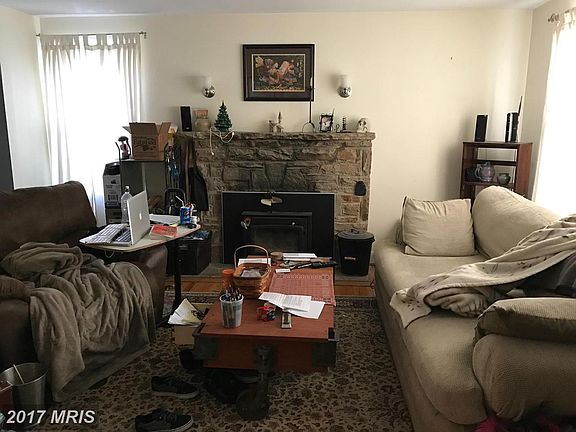 Family Room w/wood burning fireplace