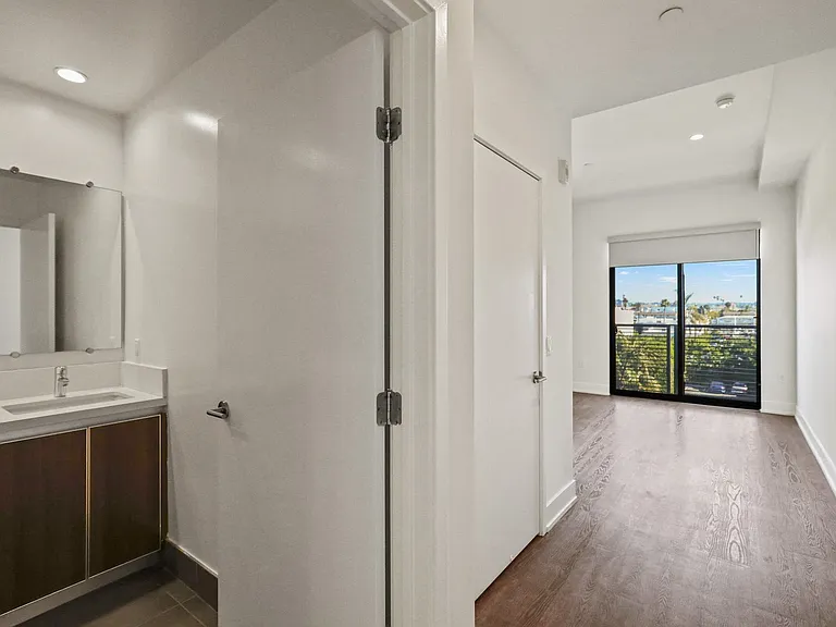 Master Bedroom with Bathroom, Vinyl Flooring, Recessed Lighting, and Balcony
