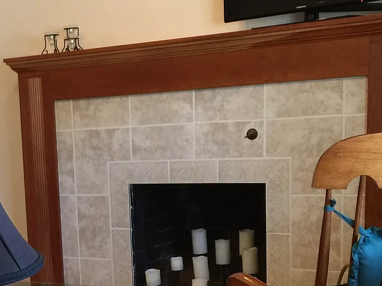 April 2025-Fireplace is with tile surround (inoperable)