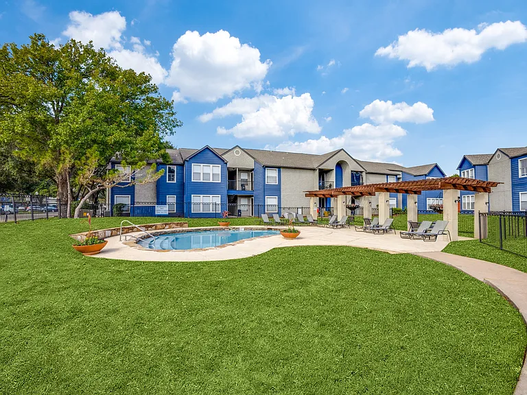 Pool and surrounding green space