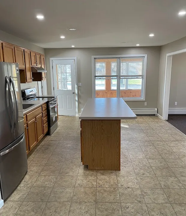 Large eat-in kitchen with brand new appliances and recessed lighting