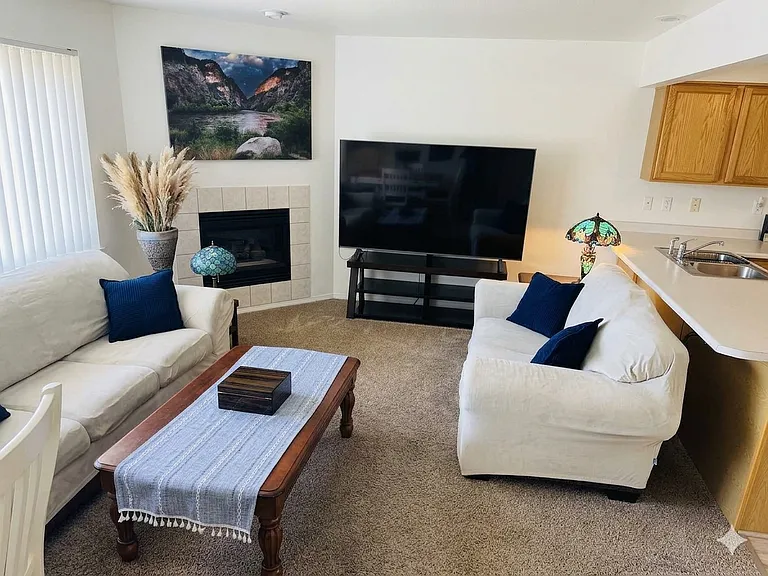 Open concept living room with kitchen