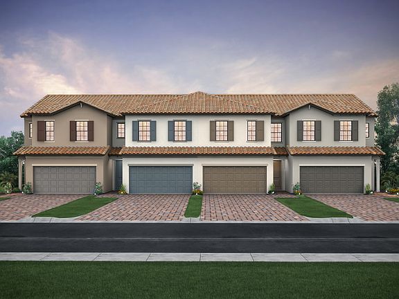 The Leland, a two-story town home with a 2 car garage, shown with Home Exterior FM2A-B 4-unit
