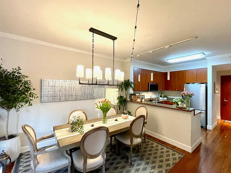 Dedicated dining area connected to the kitchen and living room.