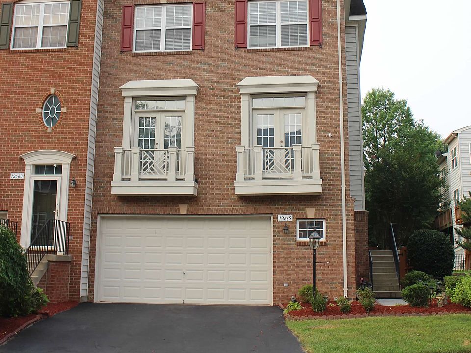 Front View - spacious 2-car covered garage, 2 additional cars can fit in driveway
