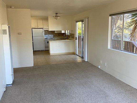 Living room, with dining area and kitchen
