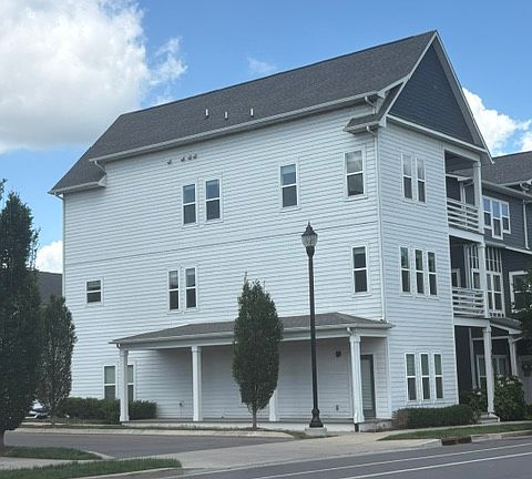 Ground level patio and decks on the second and third floors