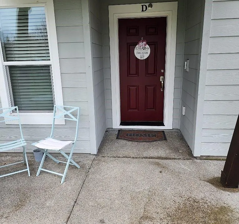 Front Entry with street parking just outside the front door. Homeowner parks in the garage and enters in the back