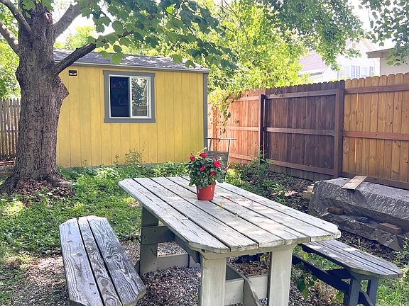 Lovely backyard with picnic table