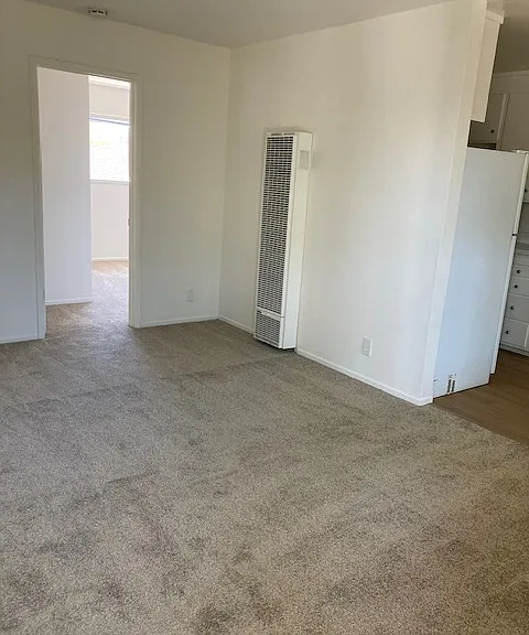 Living room with gas wall furnace