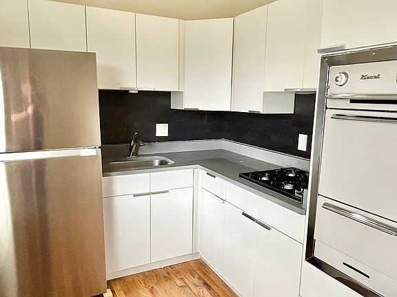 4th image of 5280 W 17th Ave #B929349c0