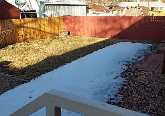 Backyard from stoop/stairs off kitchen