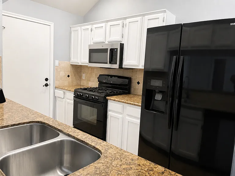 kitchen stove, microwave stove with ventilation, refrigerator