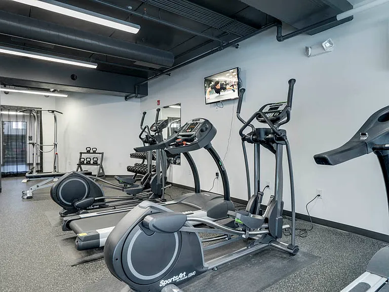Our fitness center includes cardio equipment, weightlifting machines, a yoga studio and free weights.