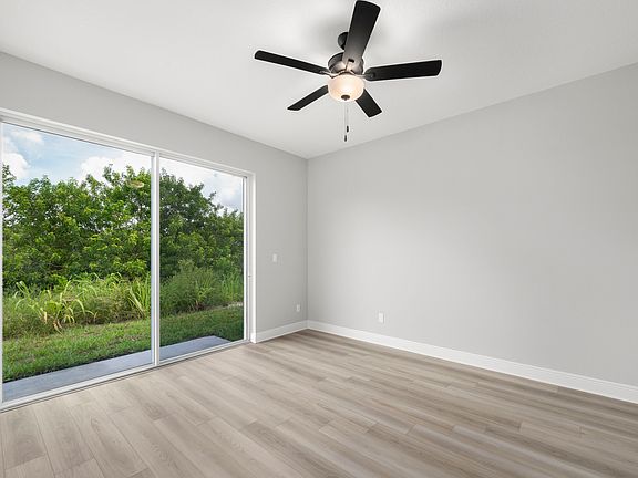 The master bedroom has access to its own bathroom