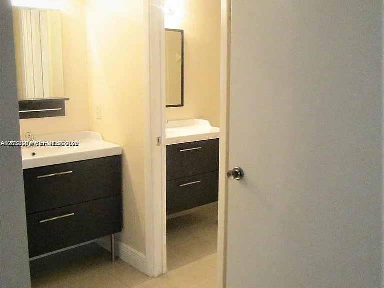 9491 Palm Cir S #205 — Photo 13