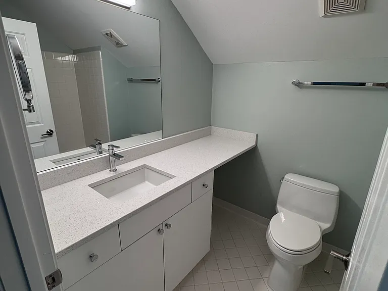 Upstairs bath features bathtub/shower combination.