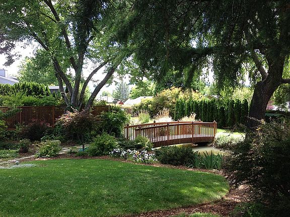 lush lawns, trees, plants