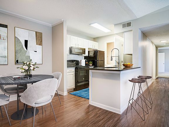 Dining area looking into kitchen