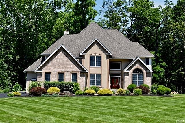Architectural 45 year roof.  Double thermal windows.   No detail spared.  This custom home enjoys four siding features:  custom brick from Arizona, stucco, high end vinyl and custom stone integrate harmoniously to provide optimal visual interest.