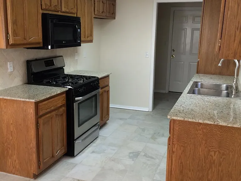 Lots of kitchen cabinets & pantry.