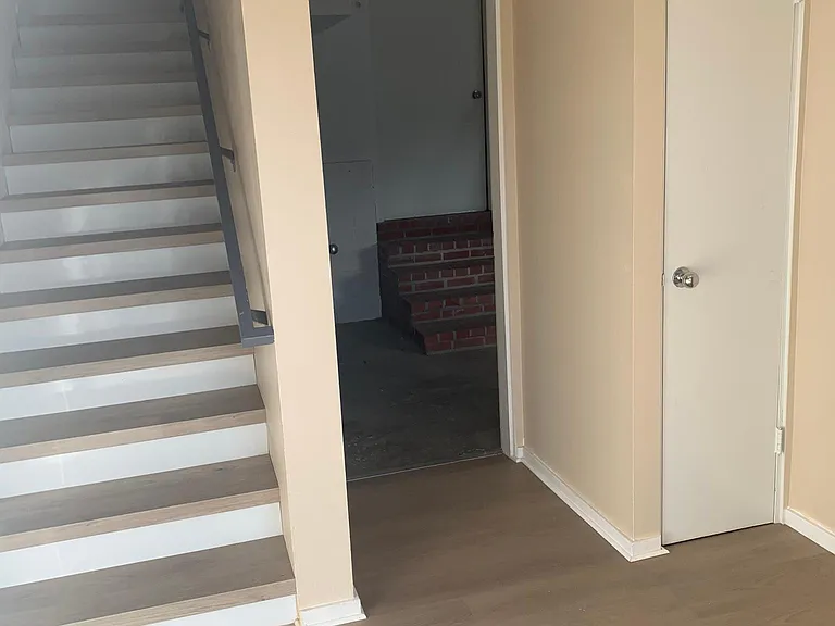 Entryway and door to garage