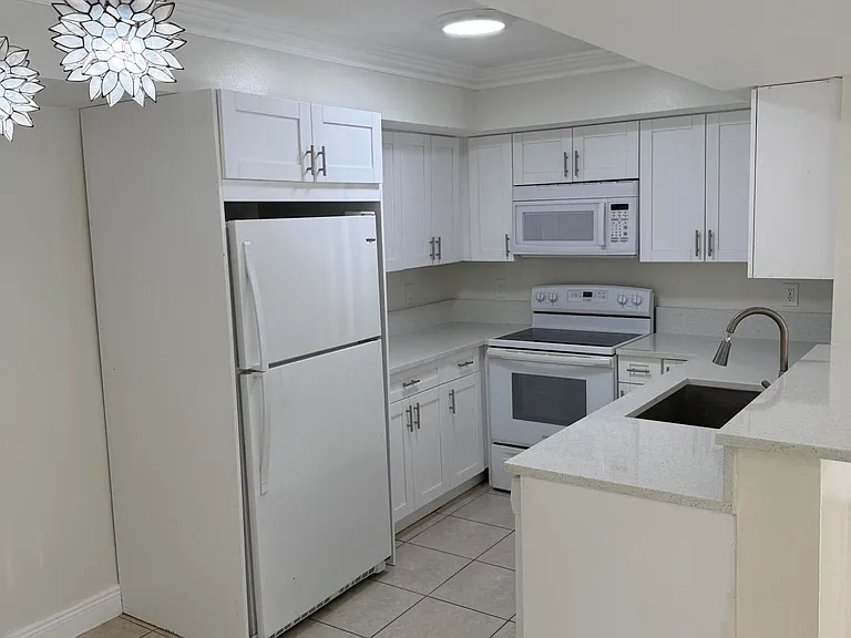 5520 NW 61st St #205 — Photo 1