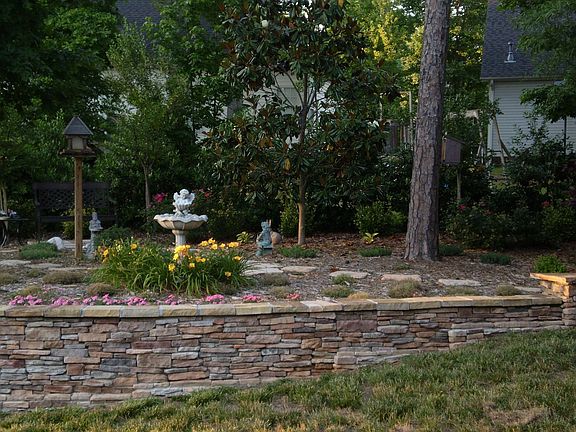 stone wall and paver pation