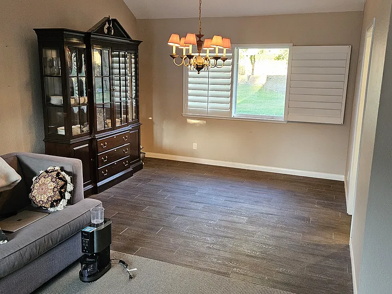 Dinning room with Hutch. There is a ethan allen table with chairs also in storage.