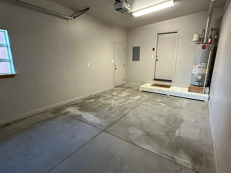 Garage looking to Garage entry door to kitchen