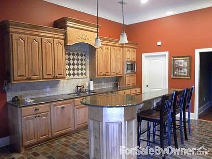Gourment Kitchen
						:
						Large kitchen with island. Granite countertops, custom cabinets, stainless app.
