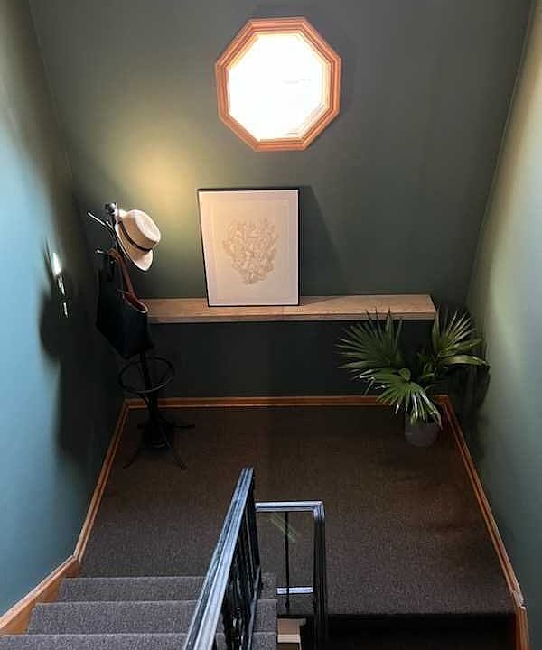 Newly painted hallway with new carpeting
