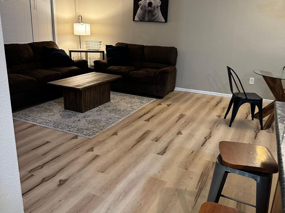 open concept living room /dining kitchen area.