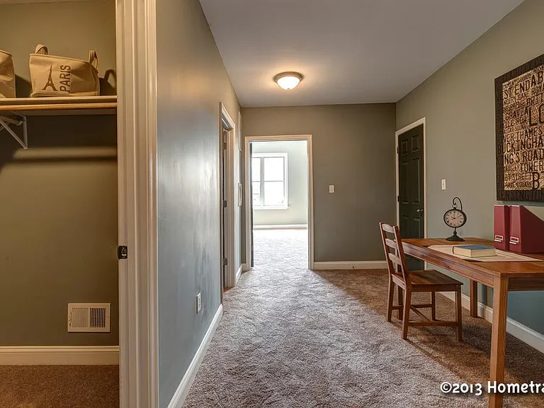 Master hallway with two large walk in closets and additional linen closet