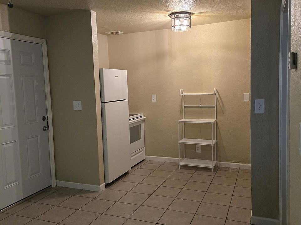 Kitchen includes a new side board rack for additional storage. Perfect for a microwave or coffee station.