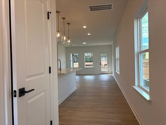 Foyer featuring the AW Collection R Serene - Soft light and open space create a calm welcome.