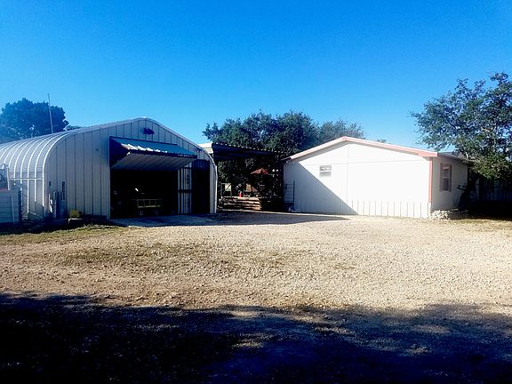 shop, carport, house