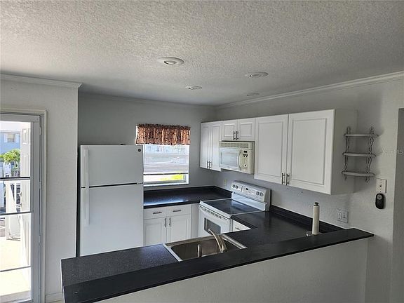 5th image of 25050 SANDHILL BOULEVARD #B1