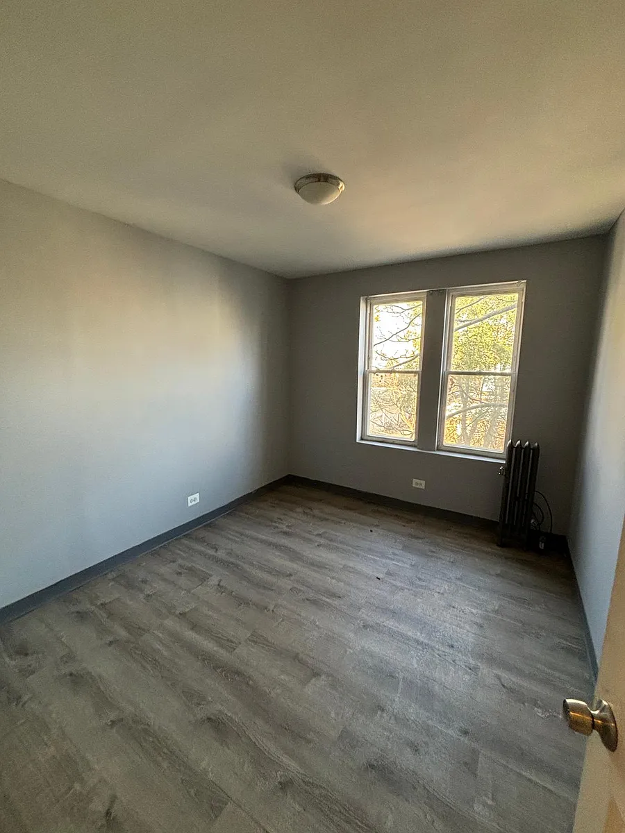 Building Photo - 7145 S Lowe Ave #402