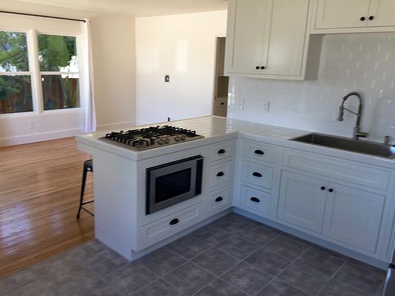 Kitchen and living room.