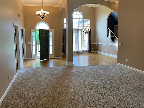 View from living room/open area to front door.