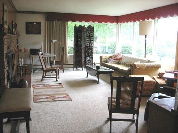 Front living room with large picture windows