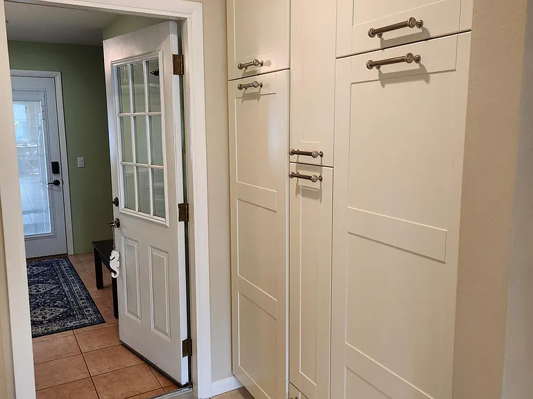 Photo prior to renovation - floor in pantry has been update.
