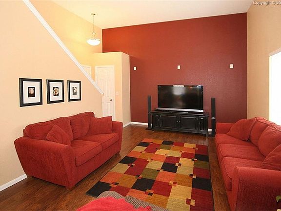 Plenty enough space for a large screen TV. Coat closet by the front door.