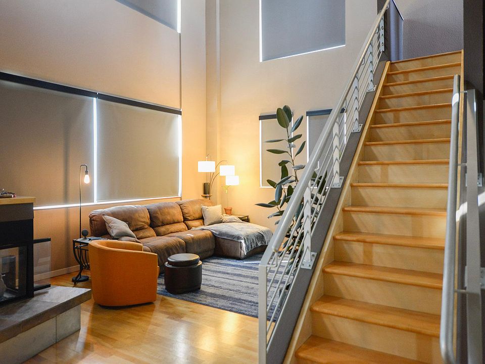 living room , stairs to loft